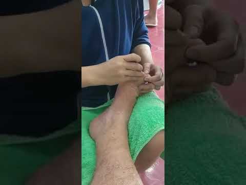 HAVING MY TOE AND FINGER NAILS CUT AT A  FRIENDS SALON ON SOI BUAKOW IN PATTAYA THAILAND.